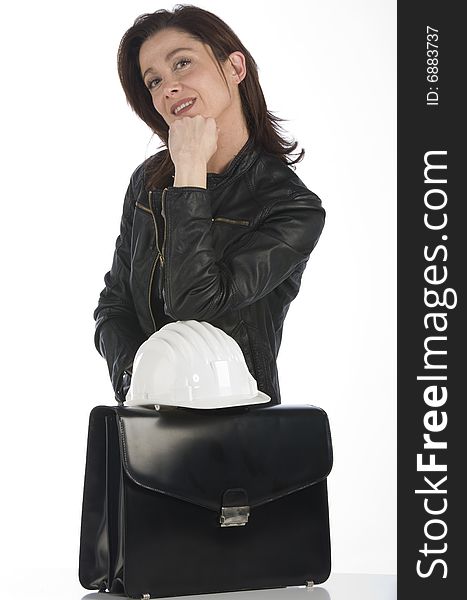 A pretty woman architect with a bag smiling