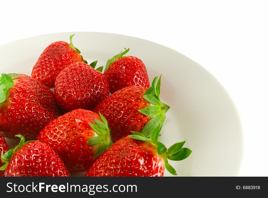 Fresh strawberries on white  plate. Fresh strawberries on white  plate