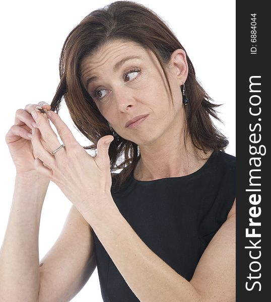 Forty years old woman watching her hair. Forty years old woman watching her hair