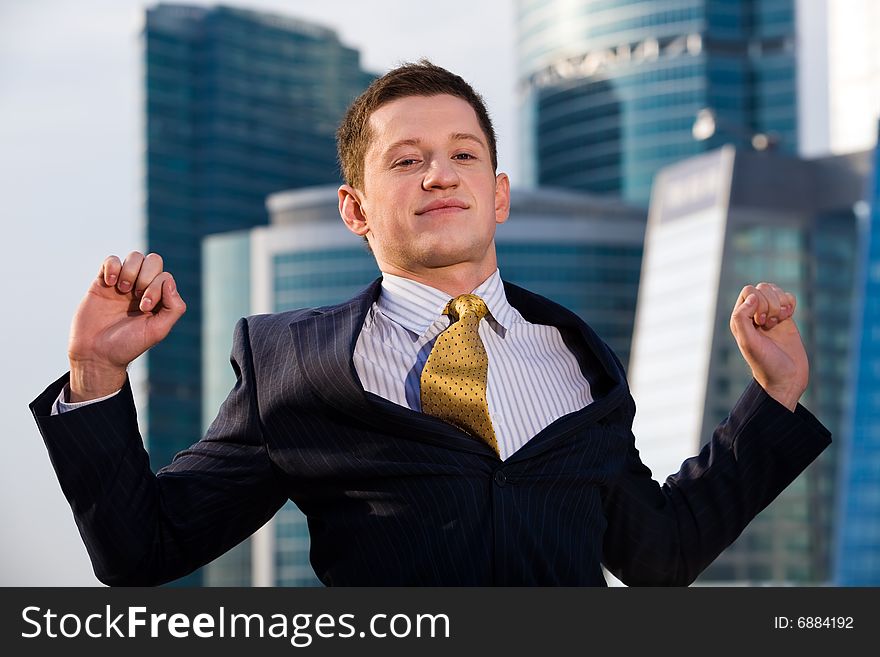 Businessman Standing With Outstretched Arms