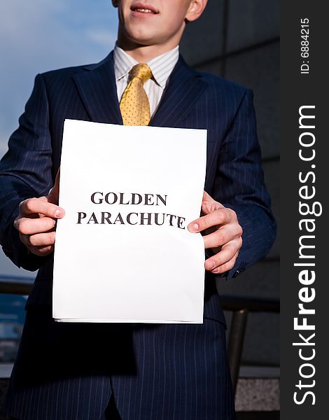 Manager Holding Document Golden Parachute