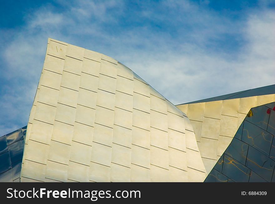Abstract photos of building wings with blue sky and clouds. Abstract photos of building wings with blue sky and clouds