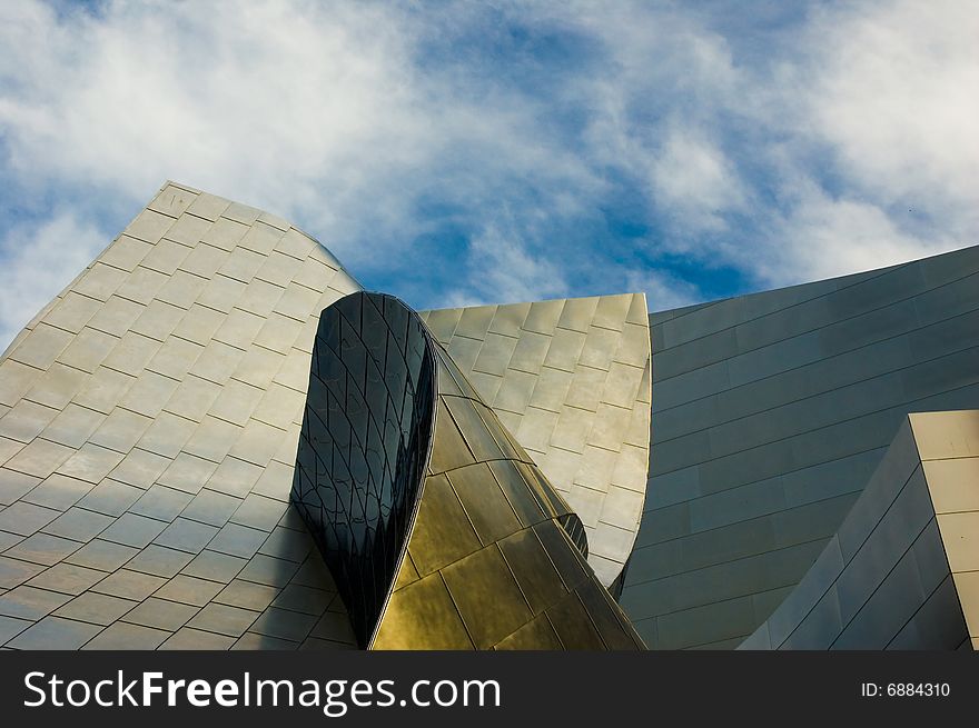 Abstract photos of building wings with blue sky and clouds. Abstract photos of building wings with blue sky and clouds