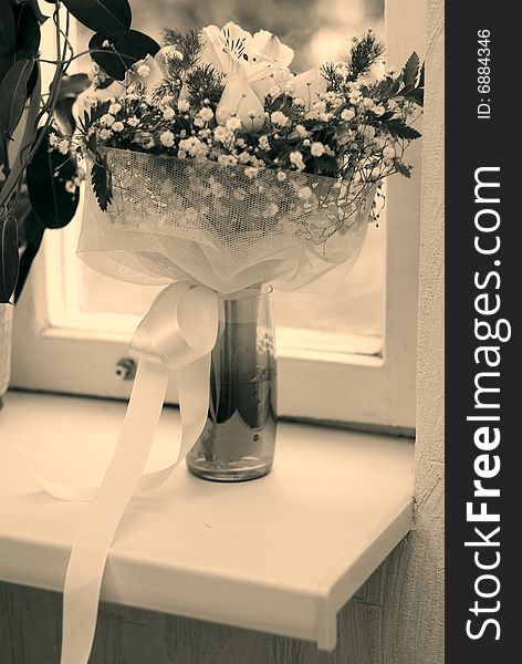 Wedding bouquet and window