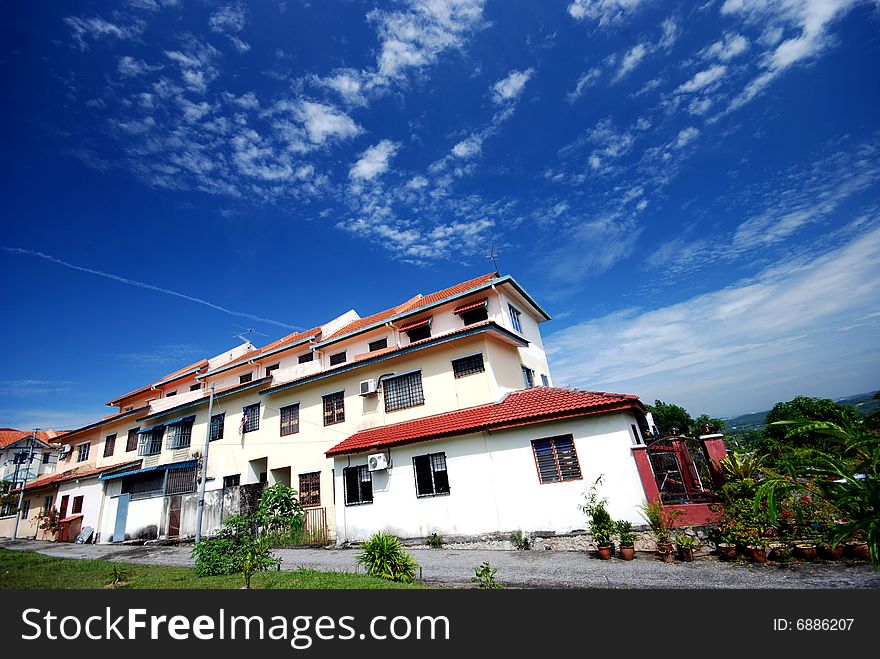 A house image on the blue sky background