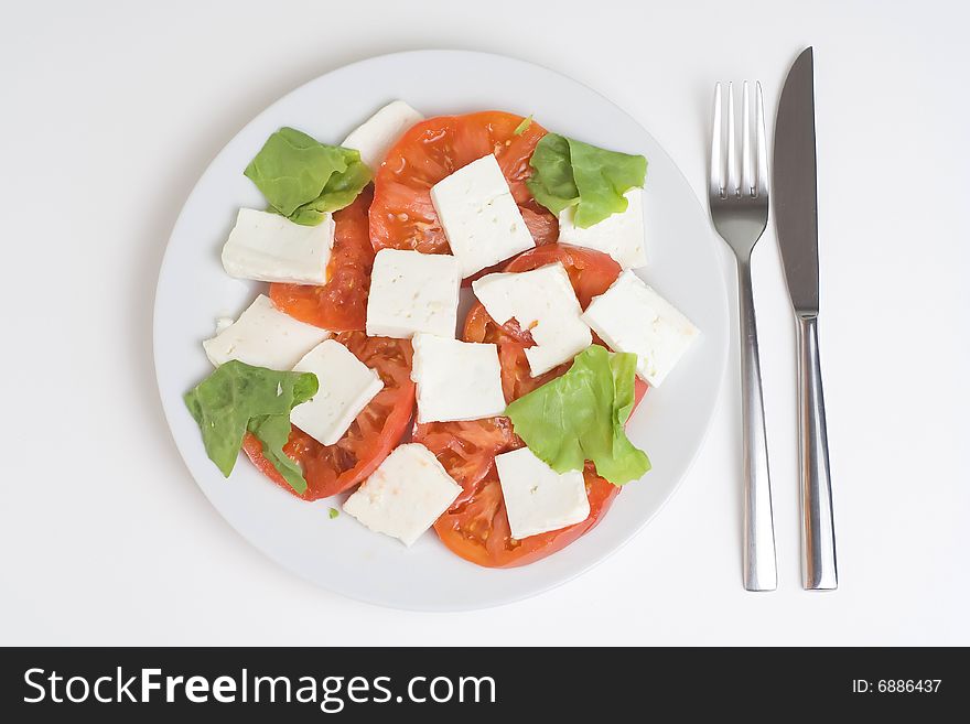 A fresh salad isolated over white background