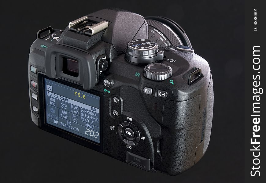 Black DSLR back view with LCD screen