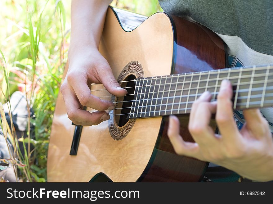 Acoustic Guitar In Hands