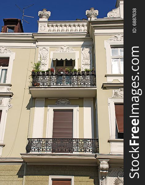 Classic building architecture details over blue sky. Classic building architecture details over blue sky