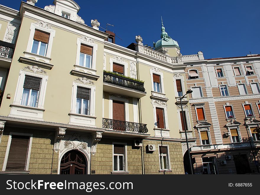 Classic building architecture details over blue sky. Classic building architecture details over blue sky