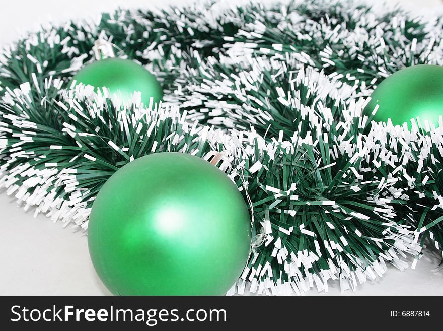 Green  ornaments on a New Year tree. Green  ornaments on a New Year tree