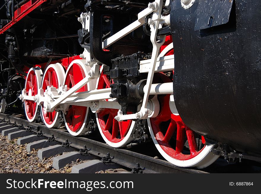 White wheels of vintage steam locomotive