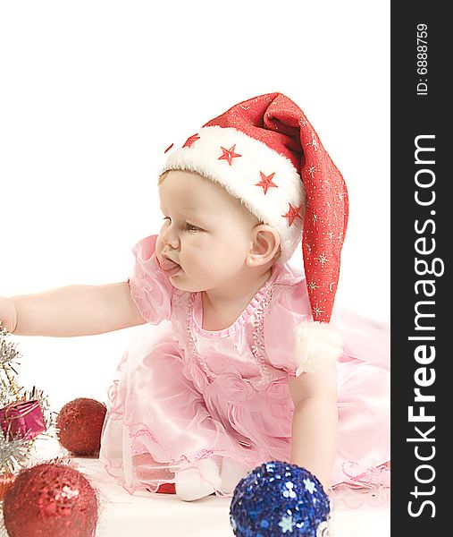 Baby in red hat on white ground. Baby in red hat on white ground