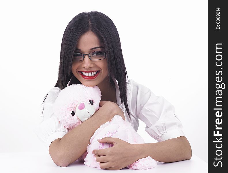 Asian girl with her pink teddy bear