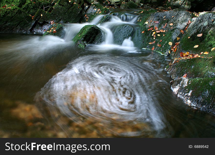 Waterfall And Autumn