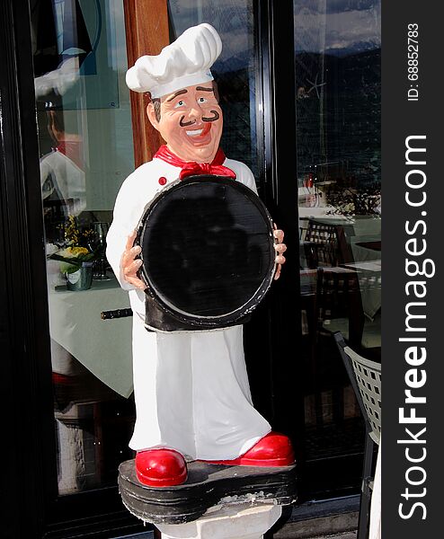 Advertising figure for restaurants : The cook .
