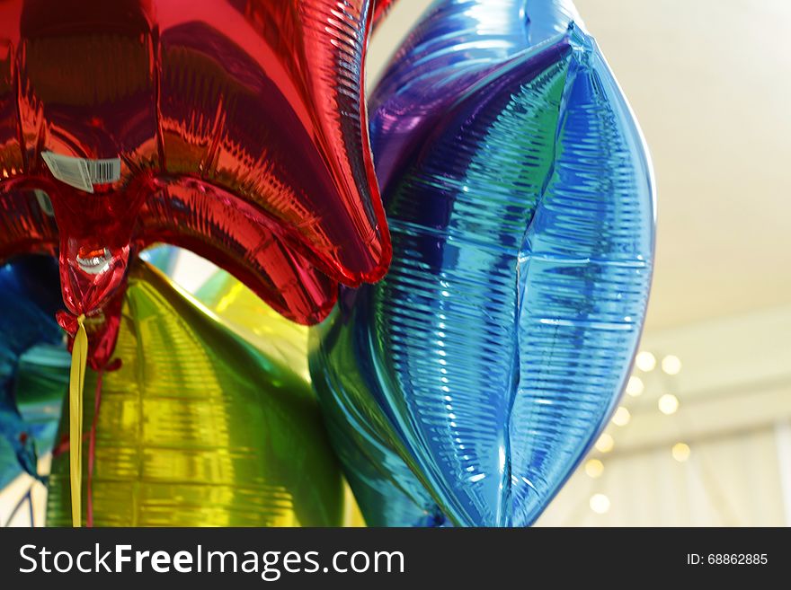 Photograph of some helium colorful bright ballons
