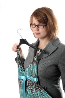 The Young Girl Tries On A Dress Stock Image
