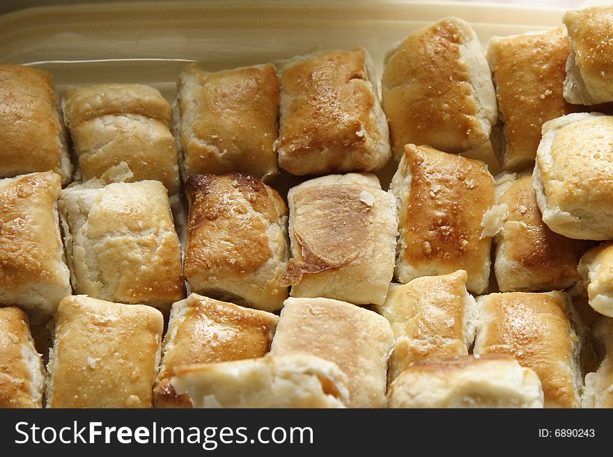 Freshly backed sausage rolls for a buffet