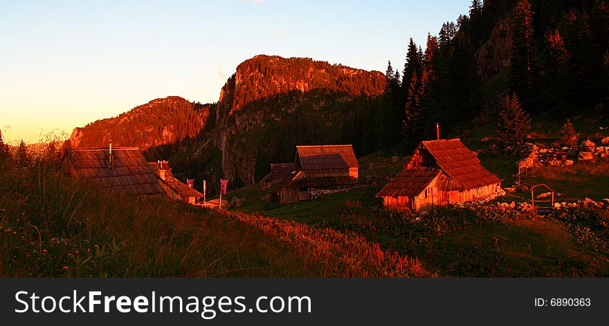 The view of the settlement situated in Julian Alps at time of sunrise. The view of the settlement situated in Julian Alps at time of sunrise