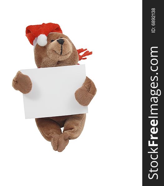Isolated cristmas teddy bear handing white tablet for your inscription. Isolated cristmas teddy bear handing white tablet for your inscription