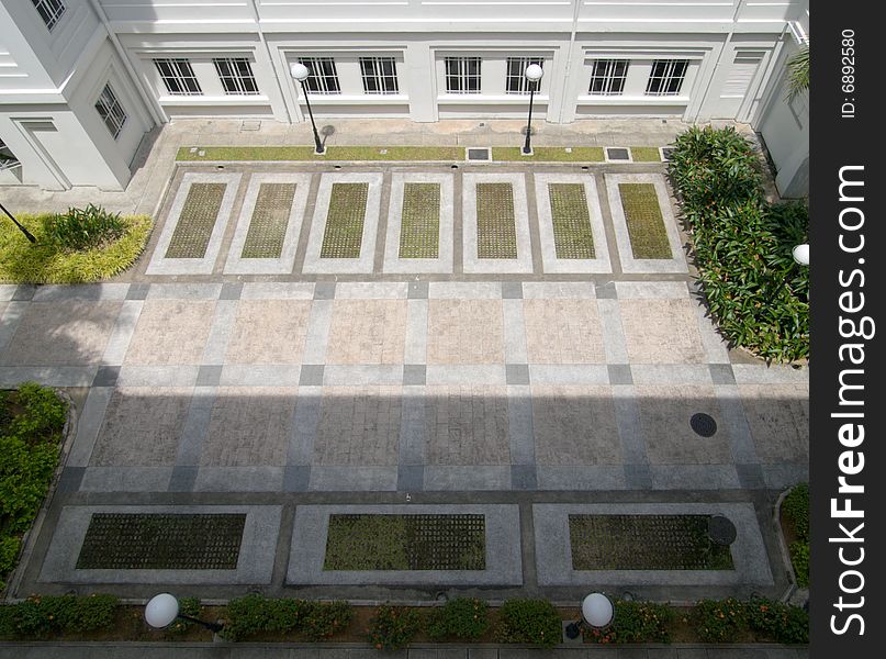 Empty car parking lots in colonial style building. Empty car parking lots in colonial style building