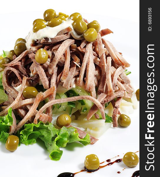 Green Peas and Meat Salad Served with Salad Leaves and Sauce. Isolated on White Background