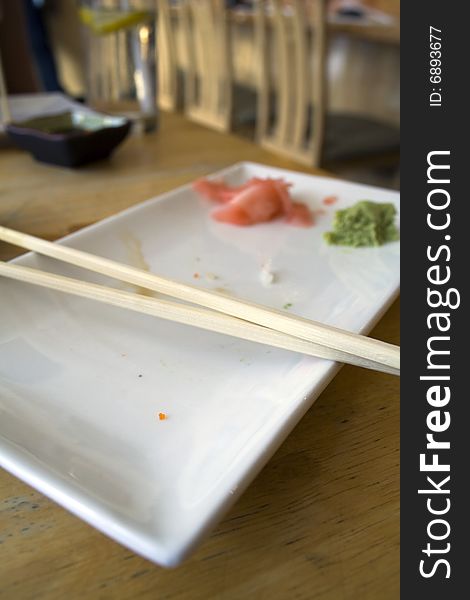 Empty plate after a meal of sushi at a Japanese restaurant