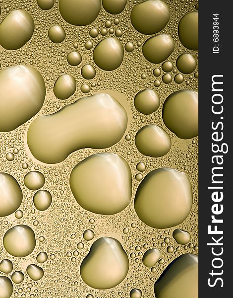 Golden water drops. abstract background