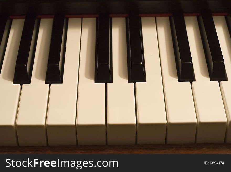 Close up of grand piano keys