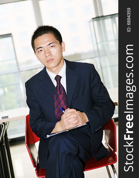 Young Asian Working In Office