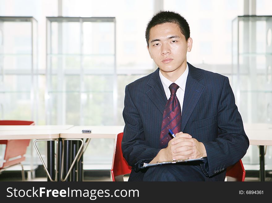 Young Asian Working In Office