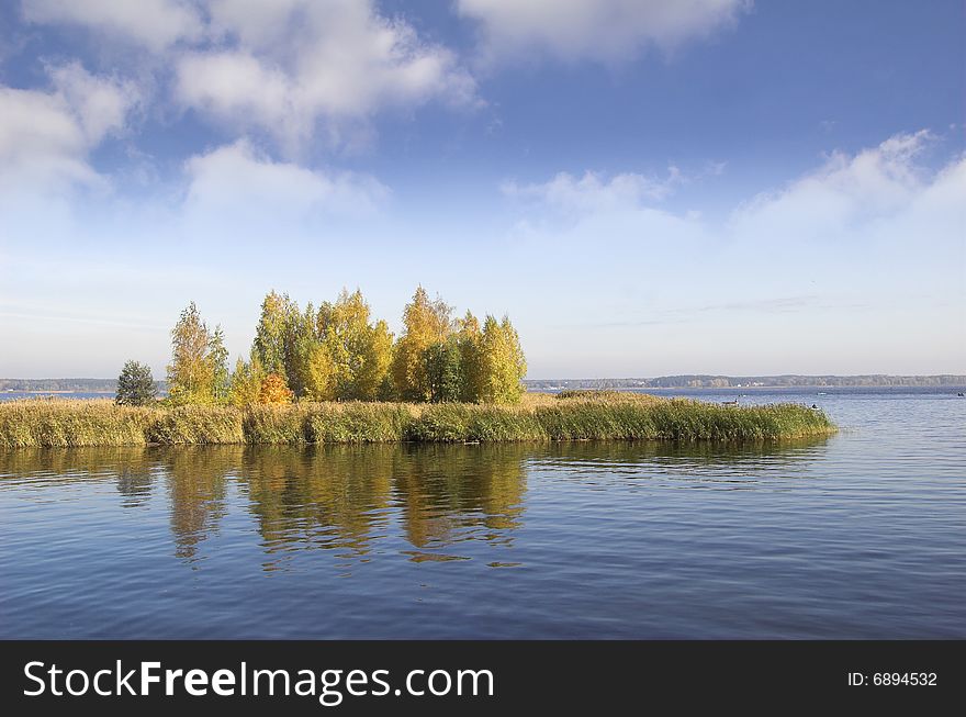 Island on the lake middle. Island on the lake middle.