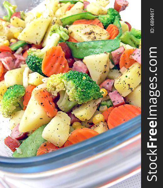 Close up of vegetables in pan prepared to baking in the oven