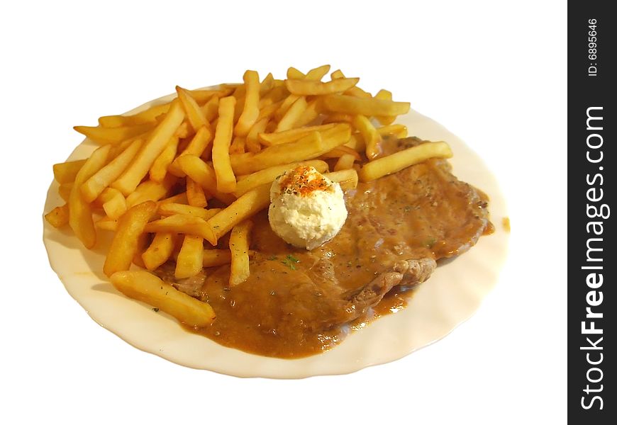 Steak with fries on the plate isolated. Steak with fries on the plate isolated