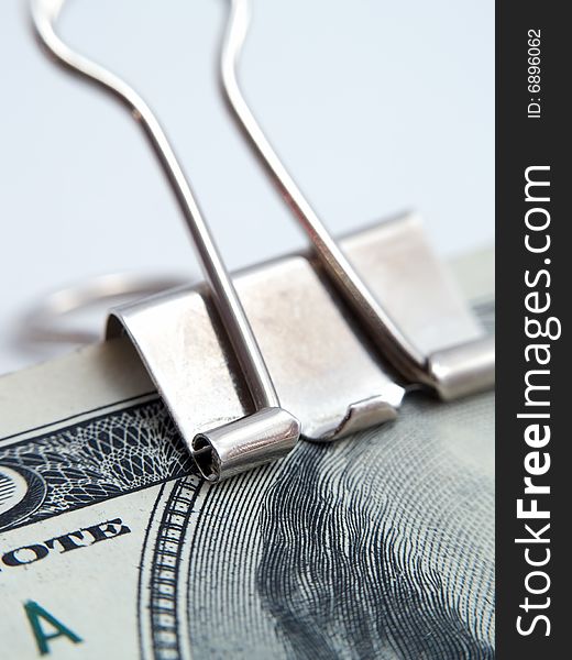 US dollars notes binded by paper-clip isolated white. US dollars notes binded by paper-clip isolated white