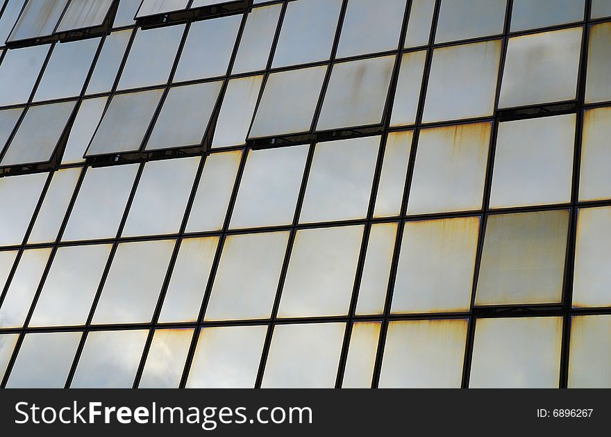 Glass wall of business center, may be used as background