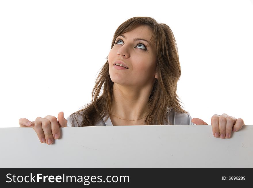 Close-up. Beautiful woman holding a billboard. Isolated on white