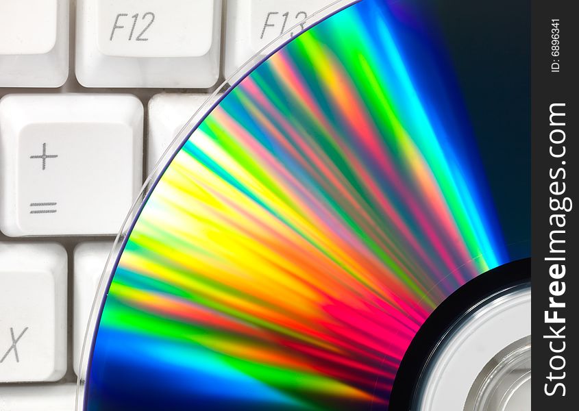 Disk on keyboard. Bright rays. Very high resolution. Disk on keyboard. Bright rays. Very high resolution.