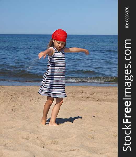Young girl is dancing on the beach. Young girl is dancing on the beach