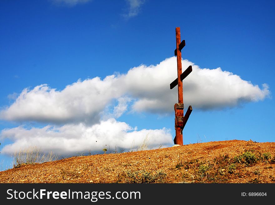 Eight-pointed [Russian] cross in mountains