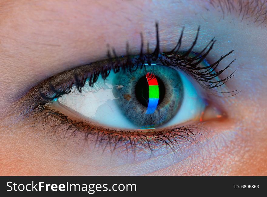 Human eye with RGB-signal reflection.