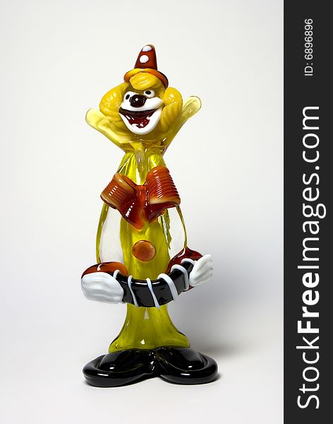 Humorous glass clown on a white background. Humorous glass clown on a white background