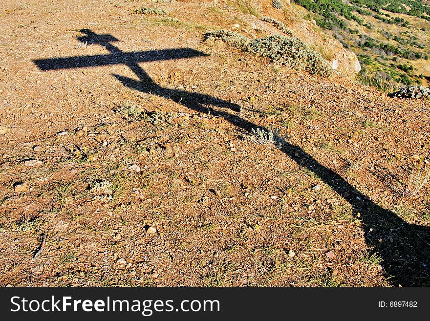 Eight-pointed [Russian] cross in mountains. Eight-pointed [Russian] cross in mountains