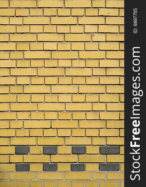 Yellow and gray brick facade