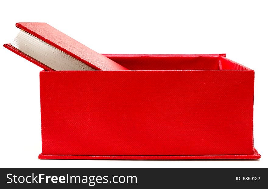 Red cover book in red cardboard box on isolated background. Red cover book in red cardboard box on isolated background.