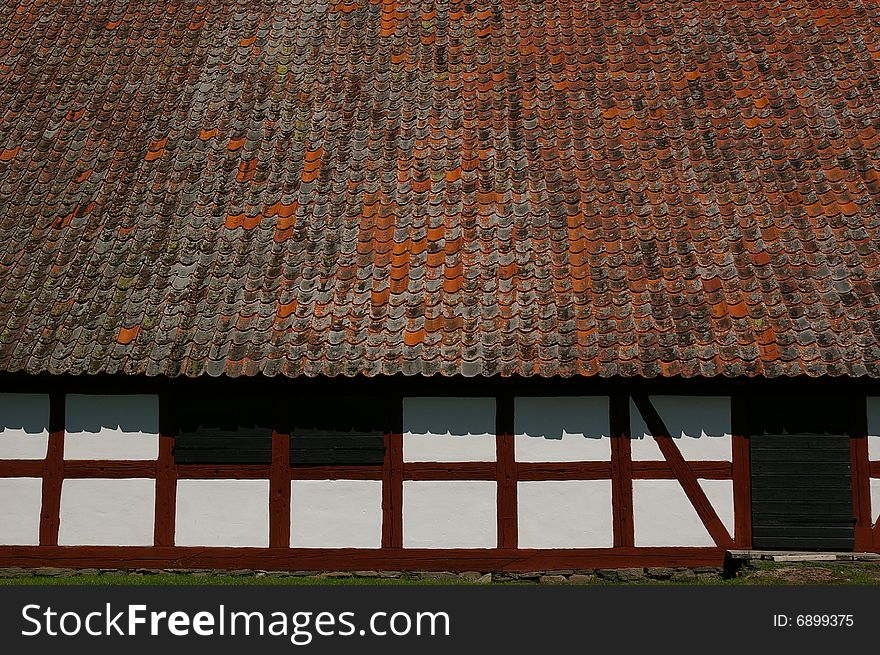 A big brick roof an a barn on VisingsÃ¶ sweden. A big brick roof an a barn on VisingsÃ¶ sweden