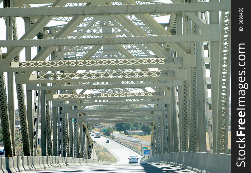 Crossing a bridge with support beams showing.