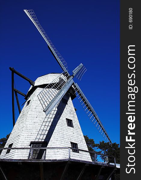 Windmill and dark blue sky