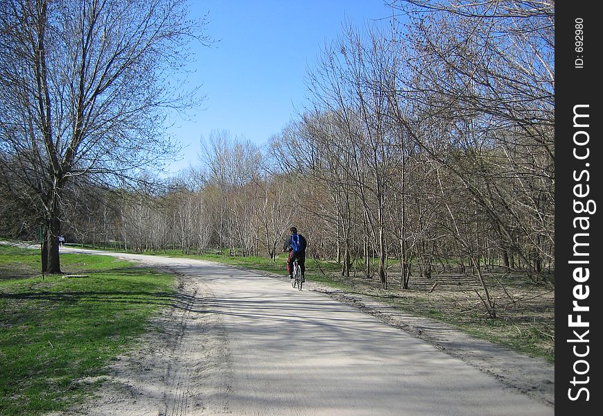 Man riding his bike. Man riding his bike